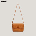 COMPASS BADGE PATINA LEATHER FLIP BAG MEDIUM CARAMEL PATINA